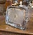 This finely crafted antique serving tray showcases the classical symmetry and decorative refinement of the Louis XVI...