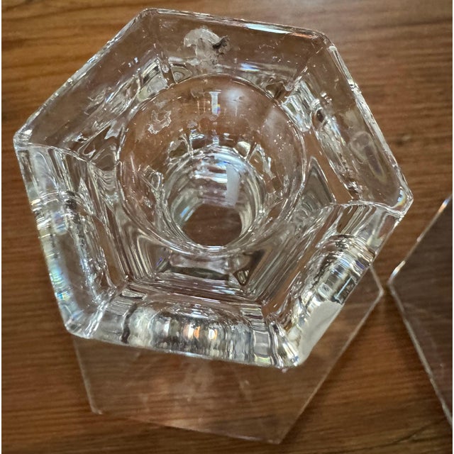 Elegant and historic, this pair of Val Saint Lambert crystal candle holders is etched with the Piping Rock Club “Liberty...