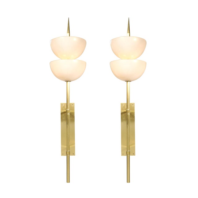 This pair of modernist hand-blown Murano glass sconces embodies the timeless allure of Italian craftsmanship and design,...
