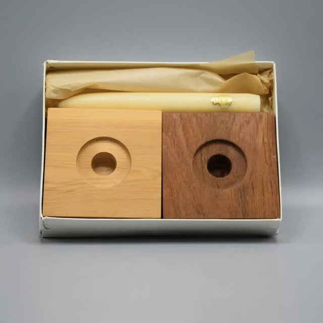 Very rare set of candle holders by Hans Wegner. The original cardboard is included and 2 of the original candles from...