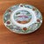 Delightful 1980s Florida souvenir plate with pink flamingos. Around the edge features five favorite destinations: Disney...