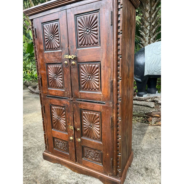 1920s Antique Indian Sunburst Carved Armoire | Dark Wood Double-Door Wardrobe Cabinet 66 For Sale - Image 5 of 6