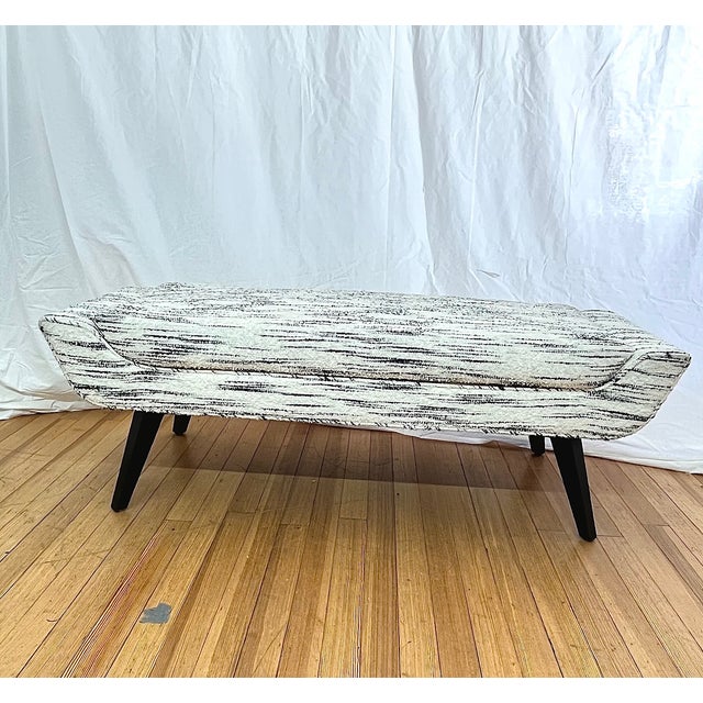 Kravet Marino bench designed by Michael Berman, featuring a clean-lined modern silhouette with gently flared arms and...