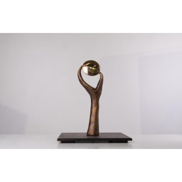 Eye of perception bronze sculpture by splady art studios design by tori hermes dimensions: w 20 x d 28 x h 34 cm....