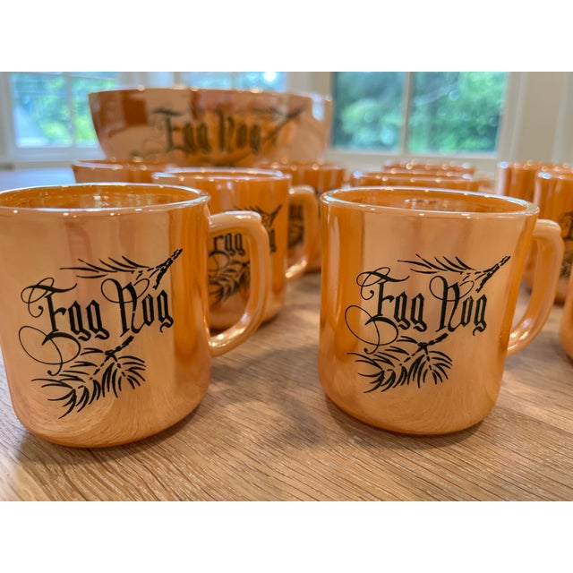 Amazing peach iridescent Egg Nog punch bowl set - bowl and 11 mini handled mugs - with a dark green spruce design and the...