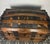 Antique dome-top trunk (also commonly referred to as a camelback, barrel-top, or humpback trunk) dating from the late...