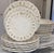 Presenting a set of 18 pieces of discontinued Venezia pattern dishes by Arte Italica. In their moss green, Italian...