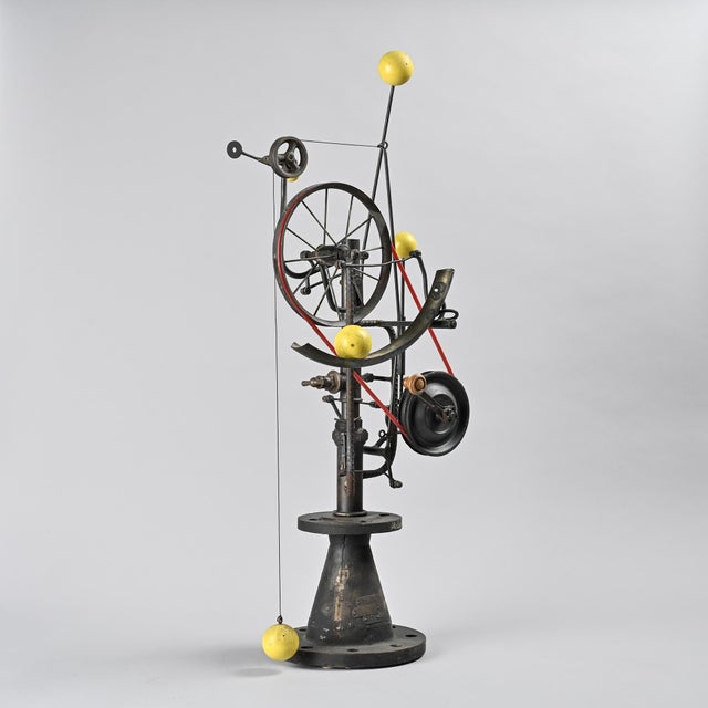 Kinetic sculpture, Switzerland. Made of welded steel from salvaged mechanical parts, this kinetic sculpture combines...