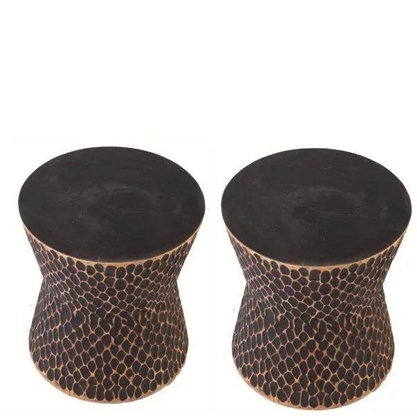 All sides of this round side table is hand chiseled and the top of this organic accent table is hand cut and and polished....
