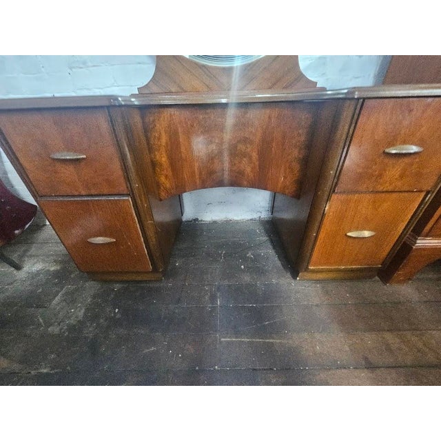 Stunning 1930s Art Deco waterfall dressing table vanity. Crafted during the height of the Deco movement, this piece...