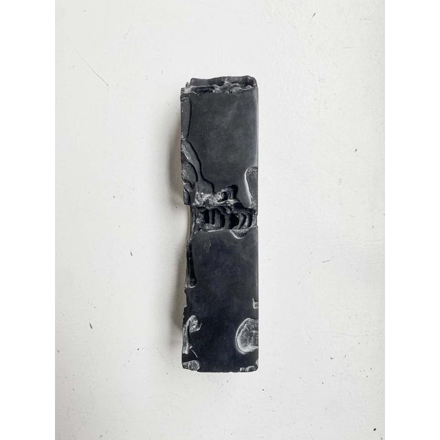Magnificent black marble from belgium 24 x 6.5 x 6 cm weight: 2kg this finely chiseled object took the artist several...