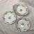 This set features antique Haviland Limoges porcelain bowls and a platter in the classic Schleiger 72 floral pattern with...