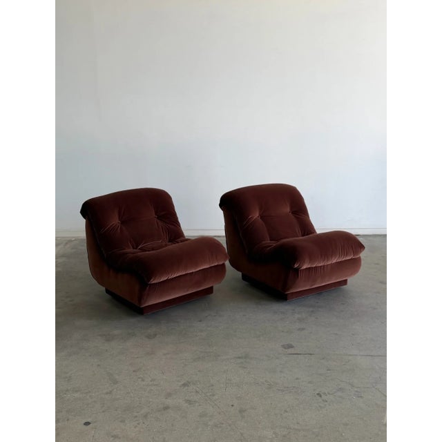 W27 D37 H30 SW26 SD20 SH20 These restored plinth base vintage lounge chairs feature a sculptural low profile silhouette...