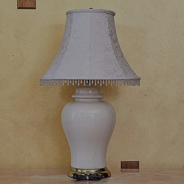 American Vintage American Ivory Glazed Ceramic Table Lamp With Brass Base and Embossed Bell Shade For Sale - Image 3 of 18