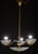 Gorgeous 1950s deco-era chandelier made of Murano glass and brass. The chandelier consists of three glass bowls and a...