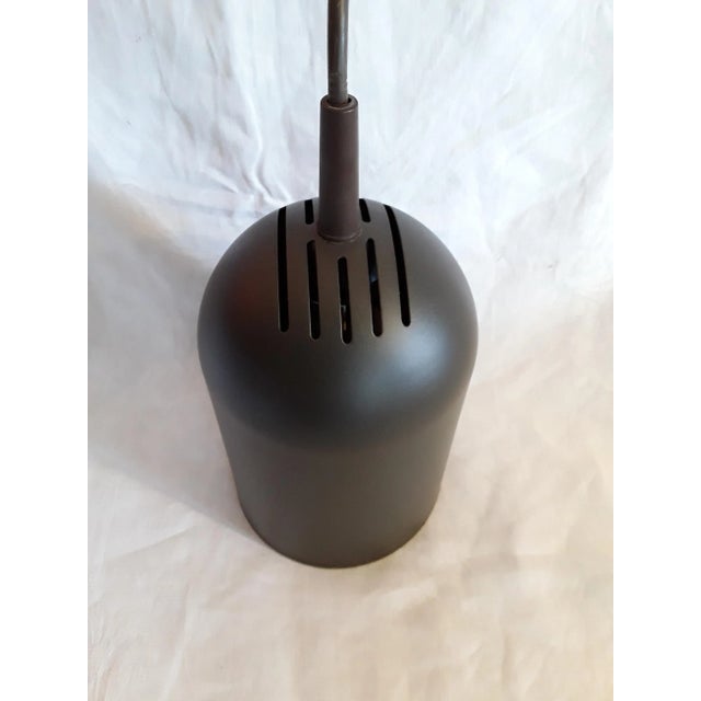 Vintage Brown Cylindrical Pendant Lamp, in Good conditions. Designed 1970 to 1979 European Plug (up to 250V).The wiring of...