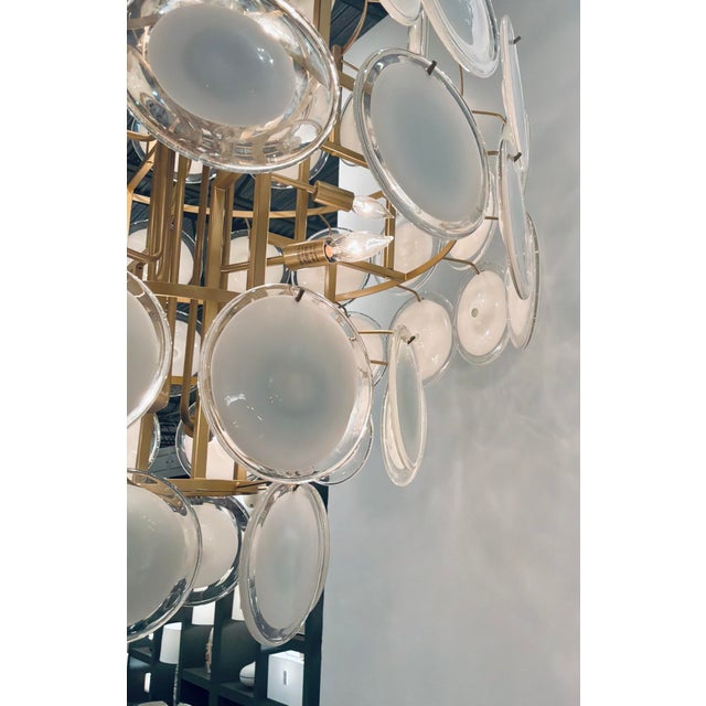 Timeless Mid-Century Modern Italian Style Glass Disc Chandelier, brass frame, showroom floor sample