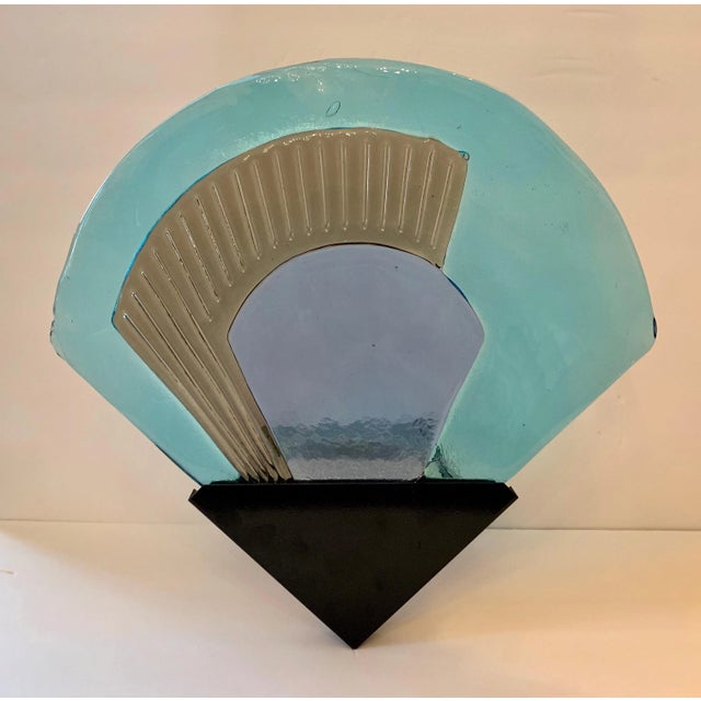 A pair of hand blown sky blue Murano Glass sconces with black enamel frames. Newly rewired.