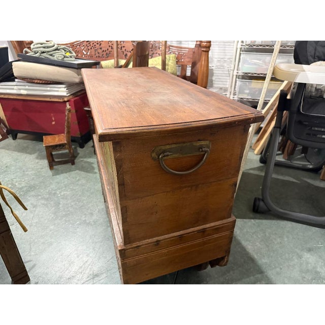 Beautiful antique wooden chest featuring richly hand-carved folk-art motifs and original painted decoration. The front...