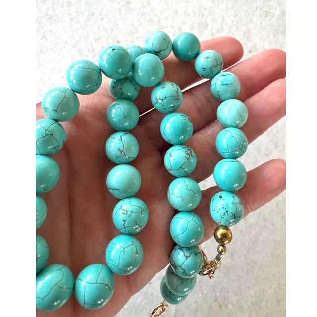 Lovely turquoise necklace with gold tone, hook, clasp designed by Matthew Izzo Bead size 12mm