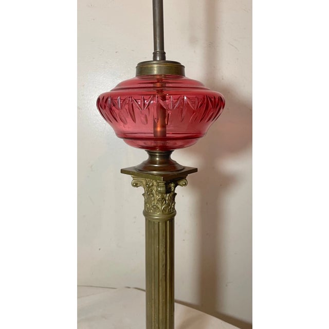 19th Century Antique Ornate Gilt Bronze Cranberry Cut Glass Electrified Oil Pillar Table Lamp For Sale - Image 5 of 12