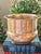 Perfect for holding an orchid or green plant, this hammered brass cache pot or indoor planter hails from the late 20th...