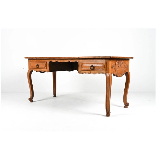 A beautifully hand-crafted, Italian oak executive desk with an exquisitely hand-carved apron of gracefully scrolling...
