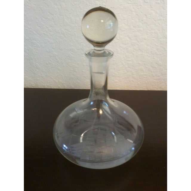 Lovely vintage Romanian Toscany crystal decanter featuring an etched tall Clipper ship on face with glass stopper.