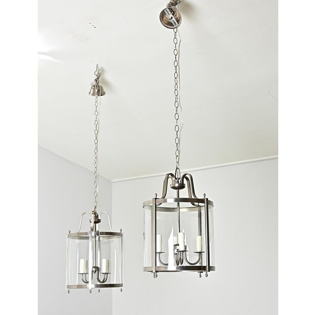 French vintage mid-century pair of lanterns in satin nickel finish that have a timeless sophistication and understated...