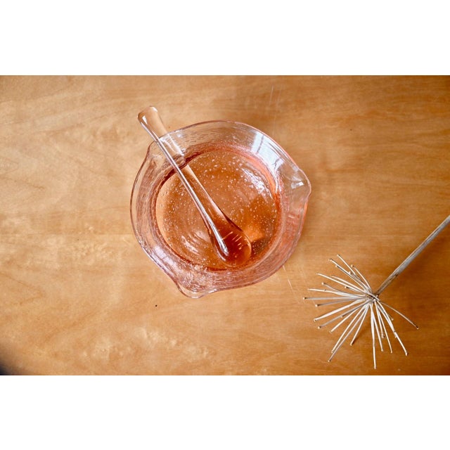 This captivating, hand-blown glass mortar and pestle set beautifully embodies the poetry of 1970s Scandinavian...