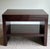 Sophisticated minimalist side table designed by Barbara Barry for Baker Furniture, executed in a richly finished dark...