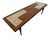 Striking Mid-Century Modern walnut and tile-top coffee table, featuring a distinctive geometric design that gives this...