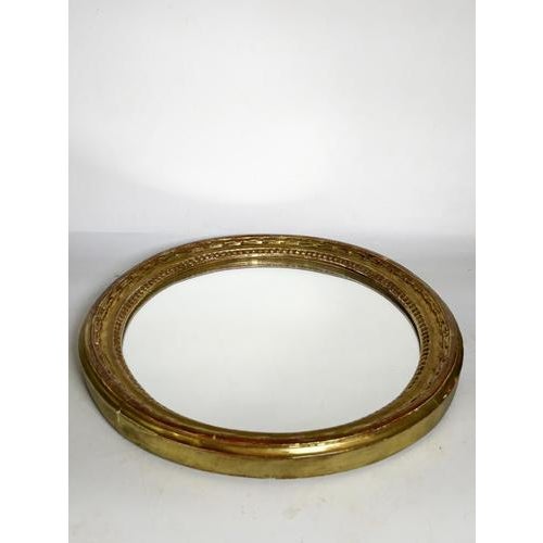 Gilt mirror, France, 19th century, a superb antique piece with authentic charm. It is distinguished by its richly molded...