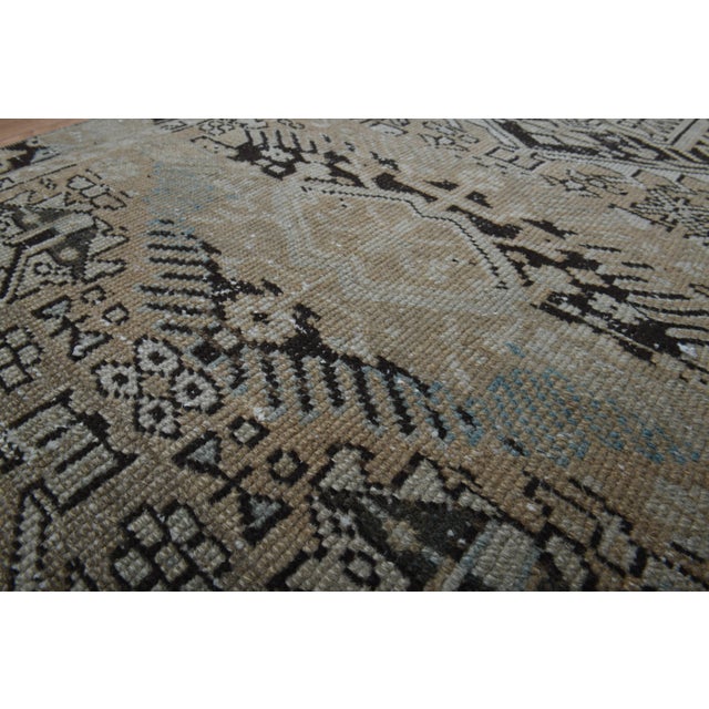 Vintage Hand-Knotted runner rug is a semi-antique vintage area rug. The '70s Eastern region of Anatolia's unique rug is...