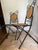 Pair of 1930s vintage French wrought iron and wicker folding chairs. Ideal for a bistro table. The wicker is in great...