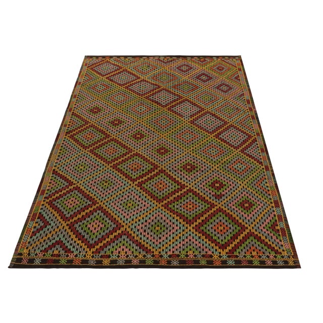 Inspired by the celebrated Kurdish style, this 7x10 Cecim kilim rug of Anatolian sensibility enjoys a prestigious position...