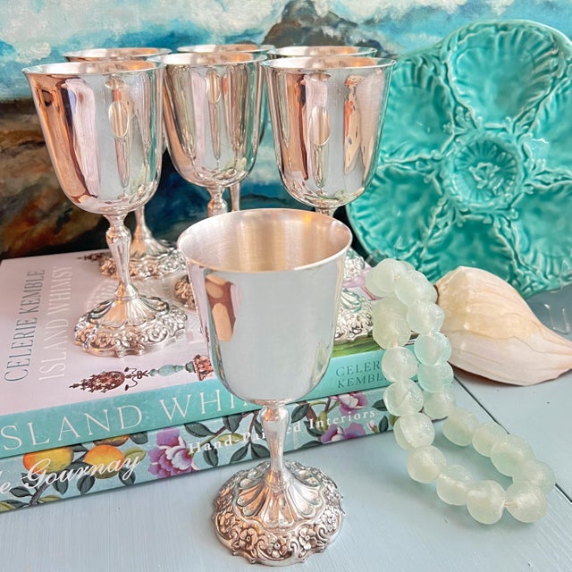Set of 7 vintage silverplated water/wine goblets by the renowned American silversmith Reed & Barton. Crafted in the...