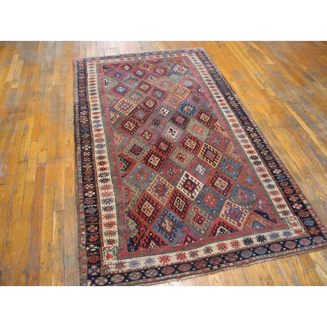 Antique Persian tribal rug, size: 4'0"x 7'4". This wildly colorful diamond design rug has the iconic #Jaf pattern. The Jaf...