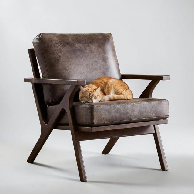 Designed by PureSilhouetteArt Materials: Leather, wood Overall width: 30 inches Overall height: 34 inches Overall depth:...