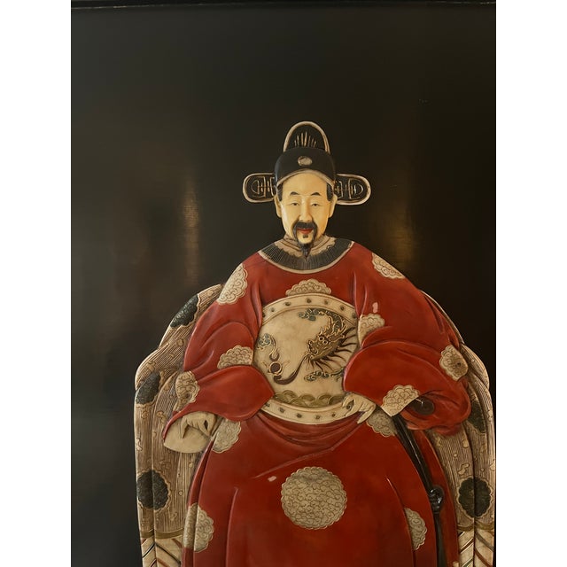 Multi dimensional hand carved and hand painted wall hanging decor which depicts the Chinese Emperor & Empress. These...