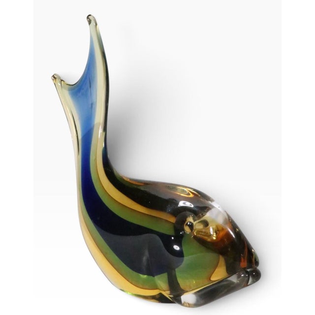 Playful and colorful art glass fish, made in Murano Italy, circa 1950/60's. This example was executed in the Sommerso...