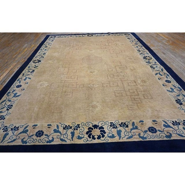 1920s Chinese - Peking Ivory Knotted Antique Rectangle Room Size Wool Rug, Circa Date: 1920s. This exceptional Chinese...