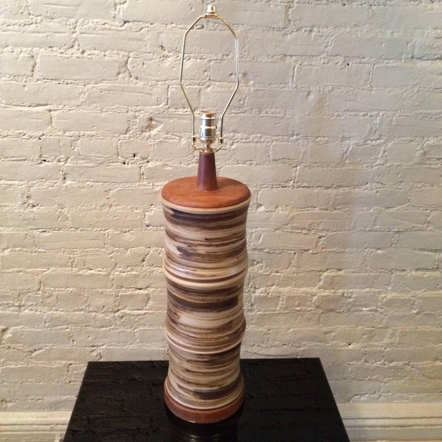 Large, Mid-Century Modern, art pottery, table lamp by Gordon Martz for Marshall Studios features stacked, ceramic segments...