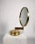Brass vanity mirror by Hans-Agne Jakobsson, 1960s. Rotating and adjustable with one sided mirror. This piece has an...