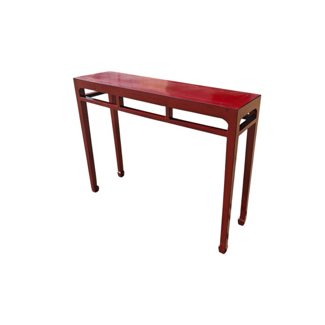This antique 19th-century console table is a traditional open-frame accent piece made from solid elm wood from the Shanxi...