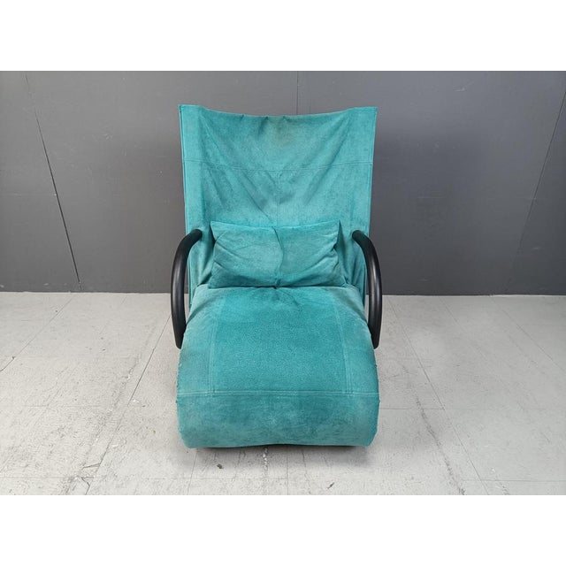 Striking black and blue suede 'Zen' lounge chair with ottoman designed by Claude Brison for Ligne Roset. Complete with...