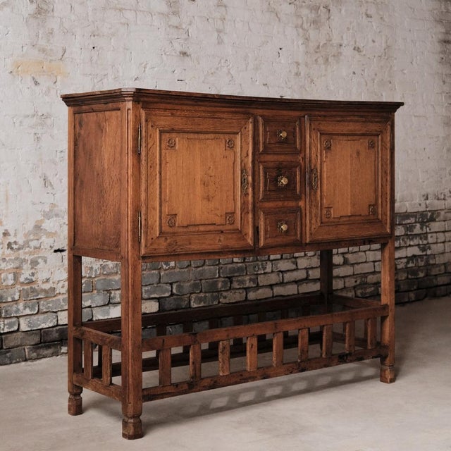 19th-century French dish cabinet featuring an open bottom rack traditionally used for drying dishes. With its timeworn...