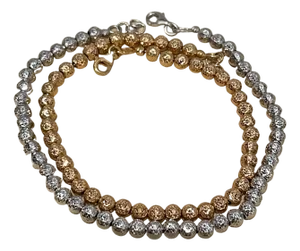 Pair of 18 Karat White Gold/ Rose Gold Ball Bracelets, 8.2 Gm