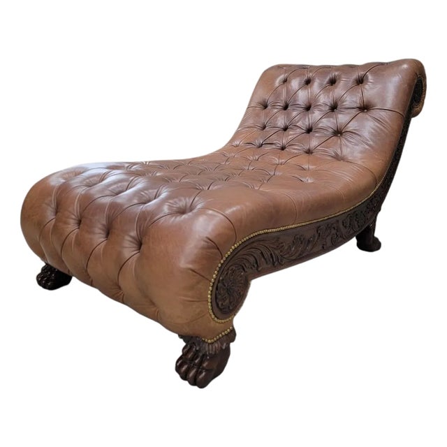 Antique Chesterfield Style Carved Oak Button Tufted Chaise Lounge With Carved Lion's Paw Feet Upholstered in Soft Italian Cognac Color Leather For Sale