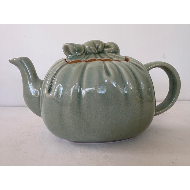 This elegant vintage teapot by Takahashi San Francisco, made in Japan, features a beautifully sculptural form with softly...